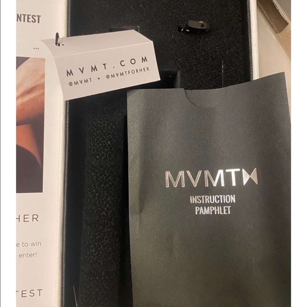 MVMT watch. Still has the plastic over the face of the watch.
